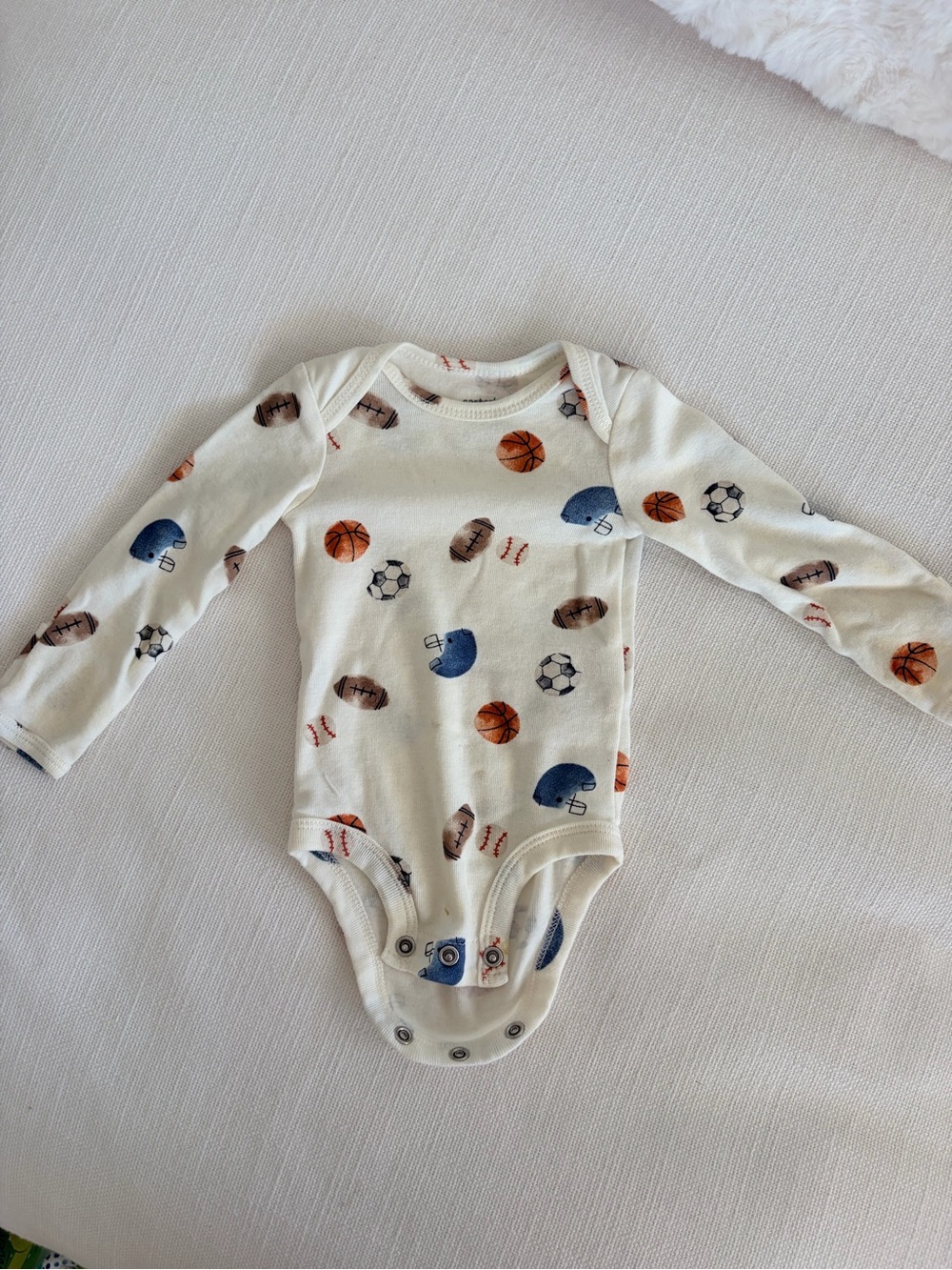 Carters Long-Sleeve Sports Print Onesie Bodysuit - Cream newborn